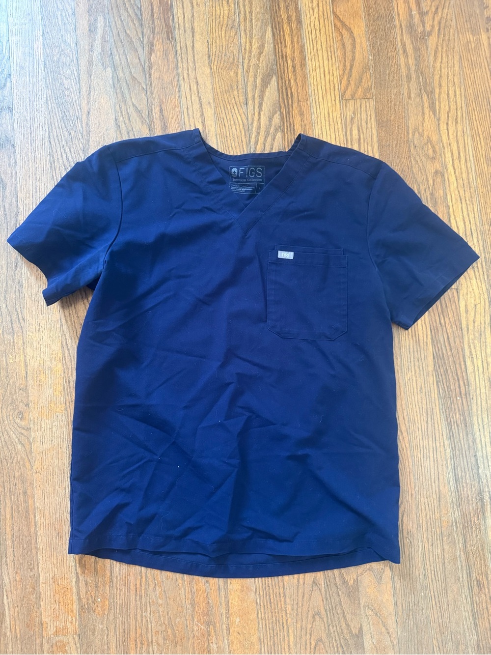 FIGS womens Navy Scrub Top with Chest Pocket